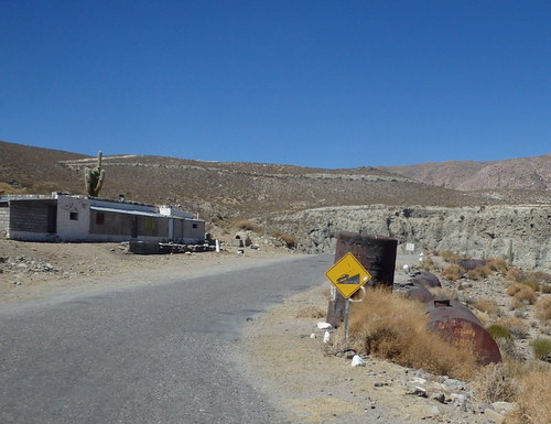 A structure like home with a lot of semi buried tanks.